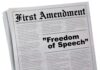 Newspaper headline about the First Amendment and freedom.