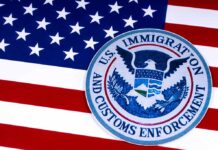 U.S. Immigration and Customs Enforcement emblem on American flag.