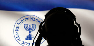 Silhouette with headphones against Israeli Mossad flag background.