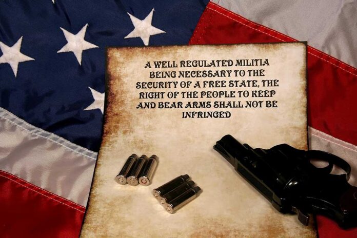 USA flag with Second Amendment, bullets, and revolver.