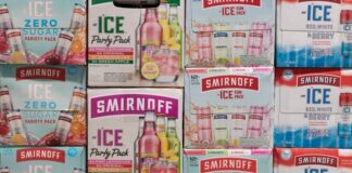 Boxes of Smirnoff Ice variety packs stacked.