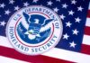 US Homeland Security emblem over American flag