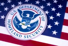 US Homeland Security emblem over American flag