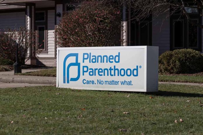 Planned Parenthood sign outside building.