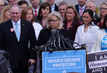 Public figures speaking at an anti-abortion rally.