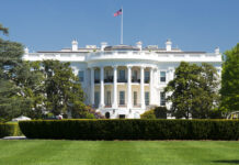 The White House with the American flag above it.