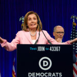 Nancy Pelosi speaking at Democratic National Committee event.