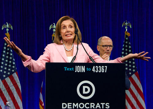 Nancy Pelosi speaking at Democratic National Committee event.