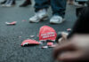 Broken hat on the ground.