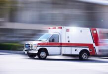 Ambulance speeding on a road