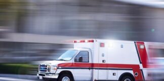 Ambulance speeding on a road