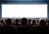 Audience watching a movie in a theater