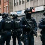 Lit Container Attack Sparks MANHUNT… Armed anti-terrorism police unit in an urban setting