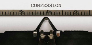 Typewriter with paper showing the word confession.