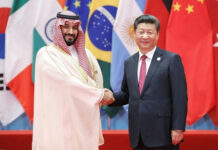 Ceasefire at RISK: Trump’s Move Could Shatter Peace Saudi Crown Prince and Xi Jinping shaking hands, flags behind.