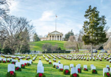 Radioactive Grave SHOCKER: Arlington Cemetery’s Hidden Hazard… Cemetery with rows of tombstones and wreaths.