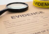Huge ‘Breakthrough’ Vanishes Under FBI Secrecy Evidence folder with magnifying glass and evidence tape.