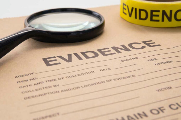 380145586-1 Evidence folder with magnifying glass and evidence tape.