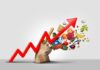 Inflation Alarm Blares Again An upward arrow made of various food items emerging from a paper bag