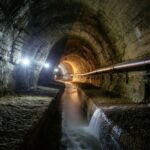 California Measles Scare Without Cases An underground tunnel with flowing water and dim lighting