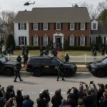 FBI agents and SWAT team outside a house during an operation