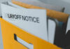 Did Meta’s AI System Fire Workers for Taking Medical Leave? Folder with layoff notice in yellow box.