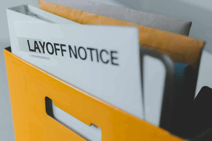 1722988393 Folder with layoff notice in yellow box.