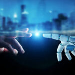 Human hand and robotic hand reaching toward each other with glowing touch