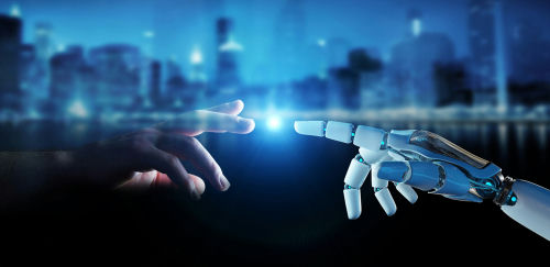 Human hand and robotic hand reaching toward each other with glowing touch