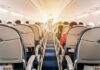 Seat Refusal Explodes Into Violence airplane cabin with passengers seated in economy class