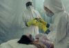 U.S. Sent an American With Ebola To Europe For Isolation – WOW! Healthcare workers in protective gear attending to a patient