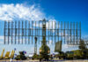 China Claims B-21 Kill — Here’s The Catch Military radar system displayed at an outdoor exhibition under a blue sky
