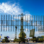 China Claims B-21 Kill — Here’s The Catch Military radar system displayed at an outdoor exhibition under a blue sky