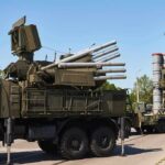 Russia-Iran Intel Link Puts U.S. In Crosshairs military air defense vehicles on a road