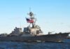 The Ceasefire That Lasted a Month — Now Both Sides Are Attacking Again naval destroyer with flags sailing on open water