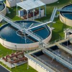 Drinking Water Shock: What’s Hiding? Wastewater treatment plant with circular clarifiers and aeration tanks