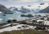 Rescue Dogs and Warships — The Venezuela Operation Raising Real Questions Military personnel and equipment on a snowy beach with helicopters flying overhead