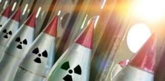 Row of missiles with radiation symbols and red tips