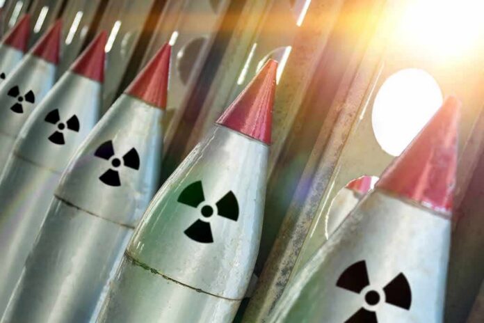 Row of missiles with radiation symbols and red tips