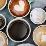 Assorted coffee cups arranged on a tabletop