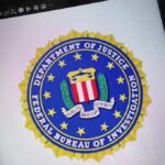 FBI seal displayed on a smartphone screen