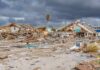 Baja Braces as Hurricane Polo Moves Closer storm-damaged coastal neighborhood with demolished houses