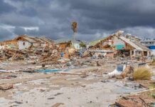 storm-damaged coastal neighborhood with demolished houses