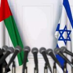 Shock Clash: Ambassador Yanked After Jab UAE and Israel flags behind microphones