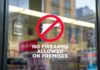 Transparency Or Trap? Council Pushes Posting No firearms allowed sign on a store window