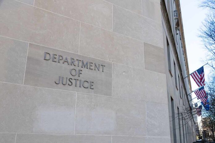 shutterstock_1605140956 Department of Justice building exterior with American flags
