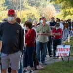 Drug-Plant Plot Rattles Missouri Race Christian Jones and others waiting in a long line outside a polling place