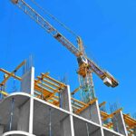 AmEx Plants Flag On 9/11 Site Tower crane over concrete building under construction