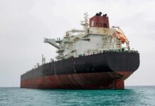Turkish Navy Strikes—Hijack Ends Fast Large oil tanker anchored in calm sea