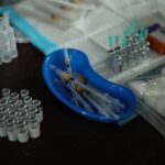 Critics Question Taxpayer-Funded Harm Reduction Medical syringes and vials arranged on a table